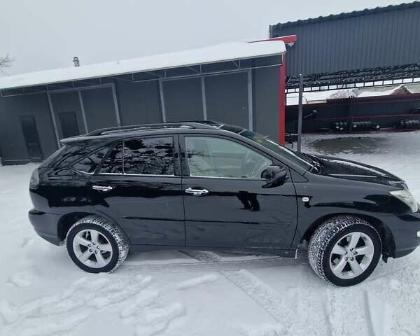 Черный Лексус РХ, объемом двигателя 3.46 л и пробегом 161 тыс. км за 11500 $, фото 15 на Automoto.ua