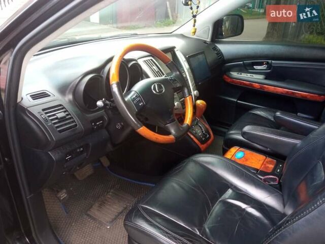 Черный Лексус РХ, объемом двигателя 3.5 л и пробегом 300 тыс. км за 9999 $, фото 2 на Automoto.ua