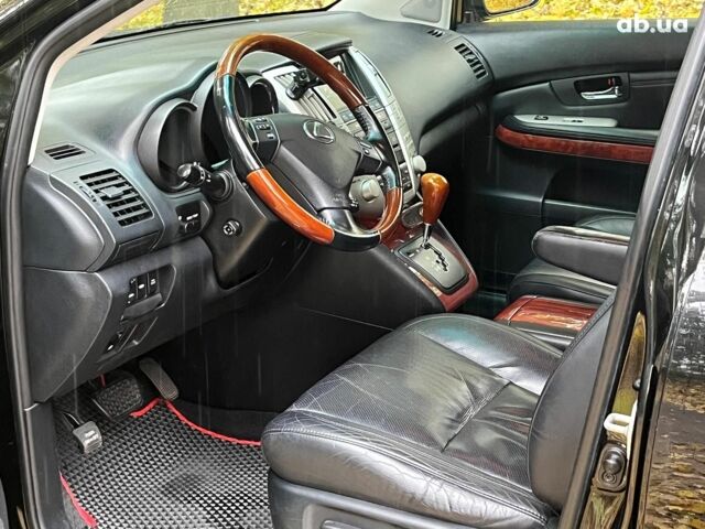 Черный Лексус РХ, объемом двигателя 3.5 л и пробегом 295 тыс. км за 10790 $, фото 13 на Automoto.ua
