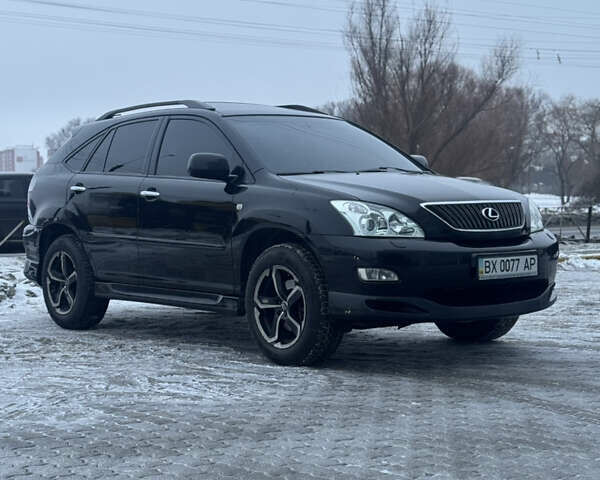 Черный Лексус РХ, объемом двигателя 3.46 л и пробегом 195 тыс. км за 11950 $, фото 81 на Automoto.ua