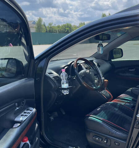 Черный Лексус РХ, объемом двигателя 3.5 л и пробегом 214 тыс. км за 14500 $, фото 4 на Automoto.ua