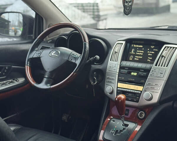 Черный Лексус РХ, объемом двигателя 3.46 л и пробегом 195 тыс. км за 11950 $, фото 114 на Automoto.ua