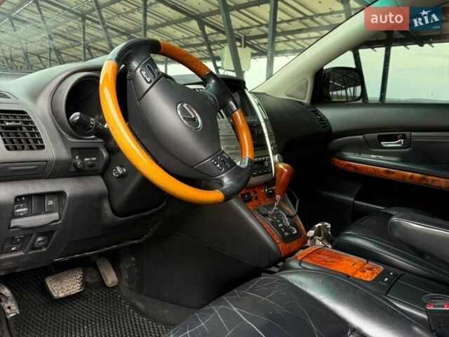 Черный Лексус РХ, объемом двигателя 3.46 л и пробегом 226 тыс. км за 10200 $, фото 7 на Automoto.ua