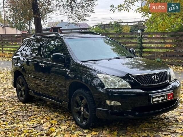Черный Лексус РХ, объемом двигателя 3.5 л и пробегом 295 тыс. км за 10790 $, фото 4 на Automoto.ua