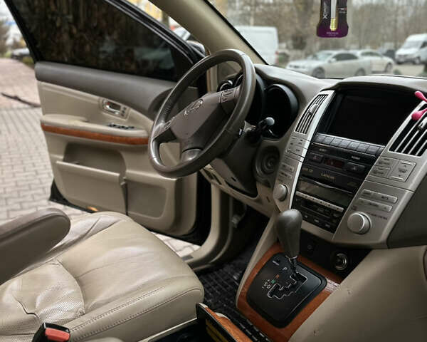 Черный Лексус РХ, объемом двигателя 3.5 л и пробегом 255 тыс. км за 12000 $, фото 8 на Automoto.ua