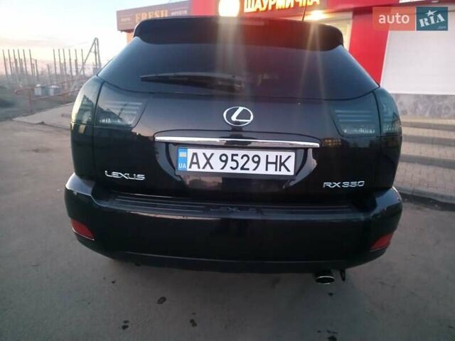 Черный Лексус РХ, объемом двигателя 3.46 л и пробегом 165 тыс. км за 13500 $, фото 2 на Automoto.ua