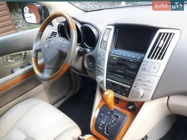 Черный Лексус РХ, объемом двигателя 3.5 л и пробегом 300 тыс. км за 16300 $, фото 2 на Automoto.ua