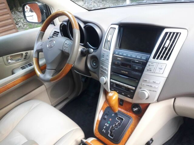 Черный Лексус РХ, объемом двигателя 3.5 л и пробегом 320 тыс. км за 16300 $, фото 1 на Automoto.ua