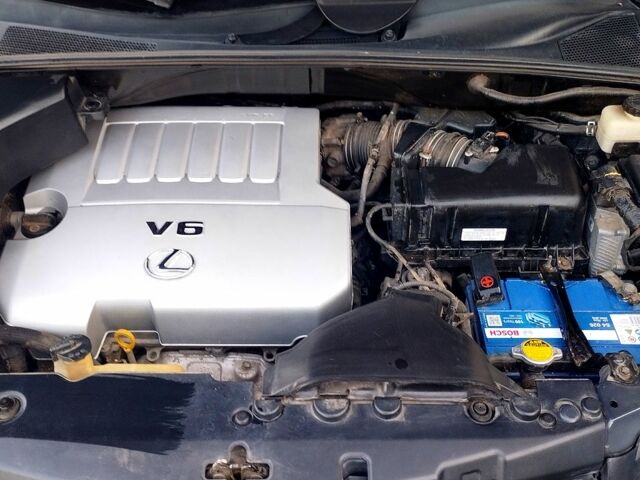 Черный Лексус РХ, объемом двигателя 3.5 л и пробегом 187 тыс. км за 11200 $, фото 1 на Automoto.ua