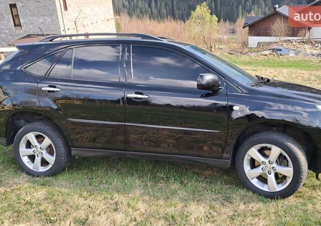 Черный Лексус РХ, объемом двигателя 3.46 л и пробегом 145 тыс. км за 17700 $, фото 15 на Automoto.ua