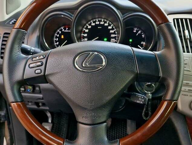 Черный Лексус РХ, объемом двигателя 3.46 л и пробегом 256 тыс. км за 11350 $, фото 44 на Automoto.ua