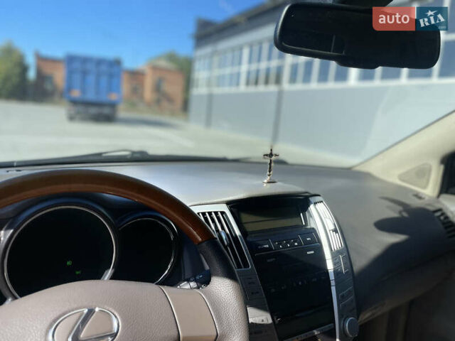 Черный Лексус РХ, объемом двигателя 3.46 л и пробегом 277 тыс. км за 9999 $, фото 3 на Automoto.ua