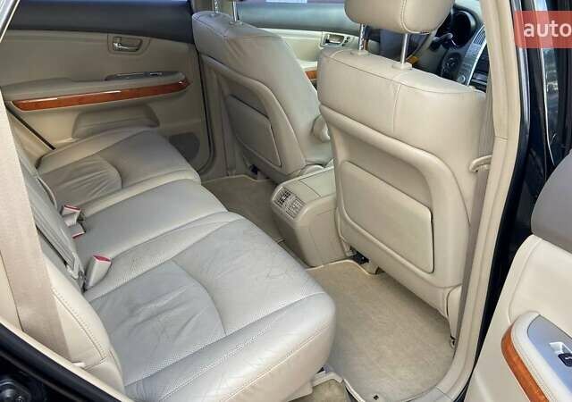 Черный Лексус РХ, объемом двигателя 3.46 л и пробегом 165 тыс. км за 11400 $, фото 4 на Automoto.ua