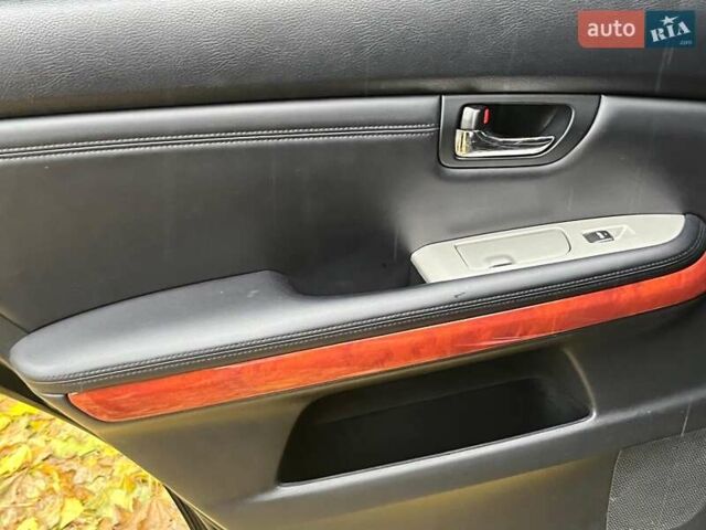Черный Лексус РХ, объемом двигателя 3.5 л и пробегом 295 тыс. км за 10790 $, фото 25 на Automoto.ua