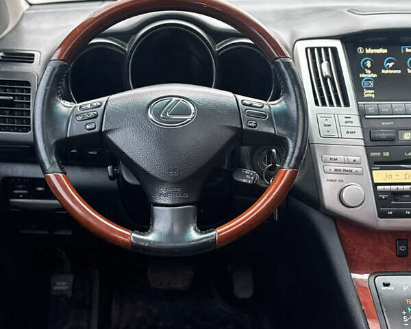 Черный Лексус РХ, объемом двигателя 3.46 л и пробегом 195 тыс. км за 11950 $, фото 137 на Automoto.ua