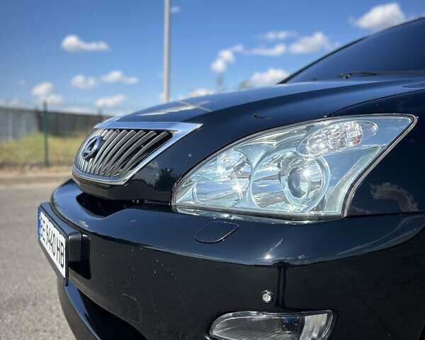 Черный Лексус РХ, объемом двигателя 3.46 л и пробегом 165 тыс. км за 13400 $, фото 4 на Automoto.ua