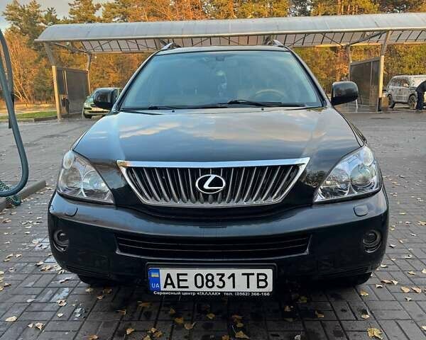 Черный Лексус РХ, объемом двигателя 3.3 л и пробегом 263 тыс. км за 13900 $, фото 1 на Automoto.ua