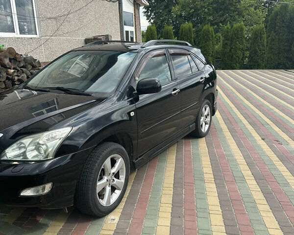 Чорний Лексус РХ, об'ємом двигуна 3.51 л та пробігом 225 тис. км за 12000 $, фото 5 на Automoto.ua