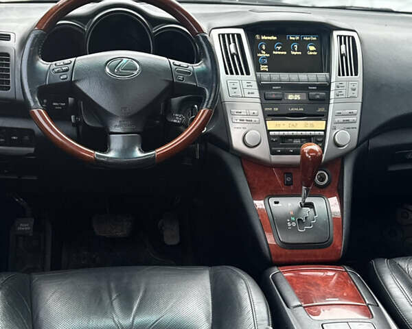 Черный Лексус РХ, объемом двигателя 3.46 л и пробегом 195 тыс. км за 11950 $, фото 162 на Automoto.ua