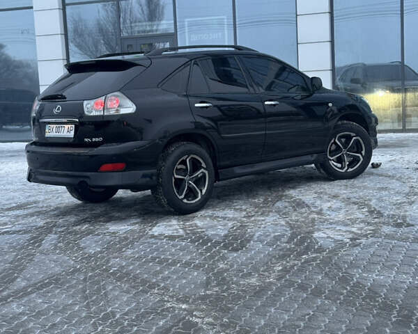 Черный Лексус РХ, объемом двигателя 3.46 л и пробегом 195 тыс. км за 11950 $, фото 187 на Automoto.ua