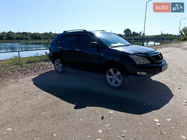 Чорний Лексус РХ, об'ємом двигуна 3.46 л та пробігом 186 тис. км за 14000 $, фото 1 на Automoto.ua