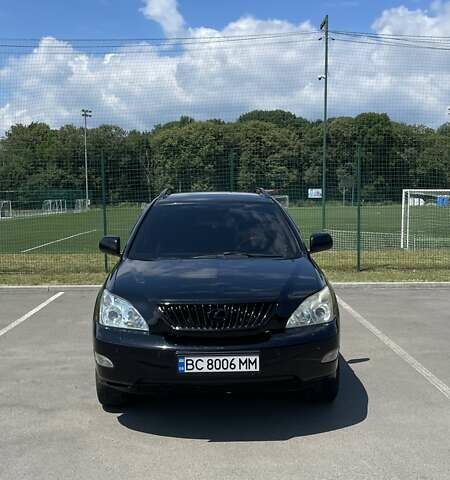 Чорний Лексус РХ, об'ємом двигуна 3.46 л та пробігом 205 тис. км за 16000 $, фото 1 на Automoto.ua