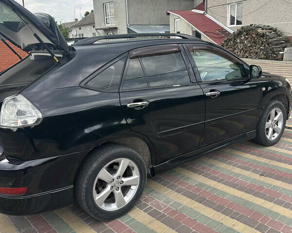 Чорний Лексус РХ, об'ємом двигуна 3.51 л та пробігом 225 тис. км за 12000 $, фото 20 на Automoto.ua