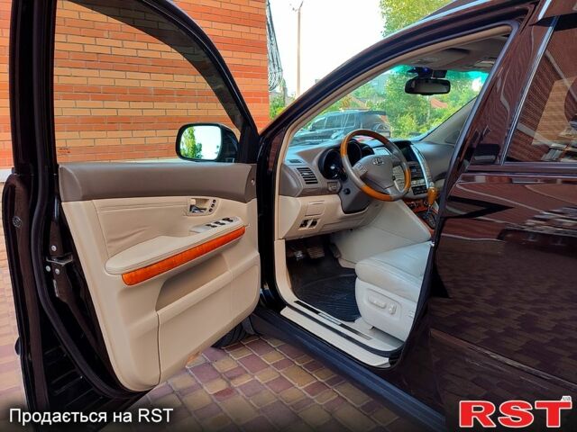 Черный Лексус РХ, объемом двигателя 3.5 л и пробегом 230 тыс. км за 14200 $, фото 1 на Automoto.ua