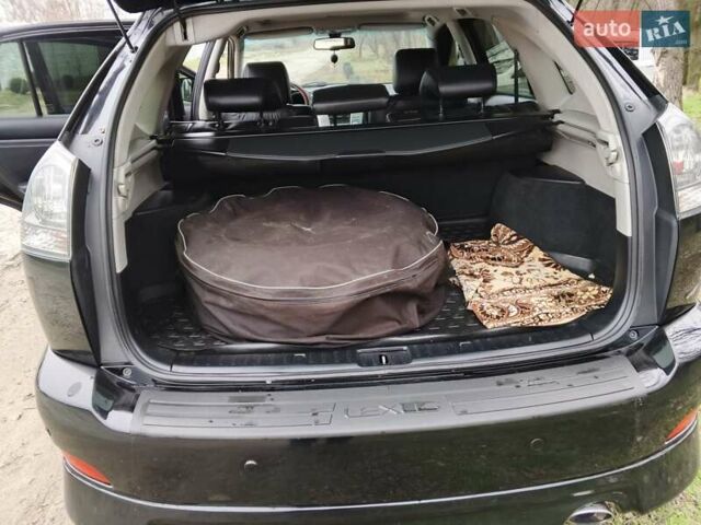 Черный Лексус РХ, объемом двигателя 3.46 л и пробегом 250 тыс. км за 11700 $, фото 5 на Automoto.ua