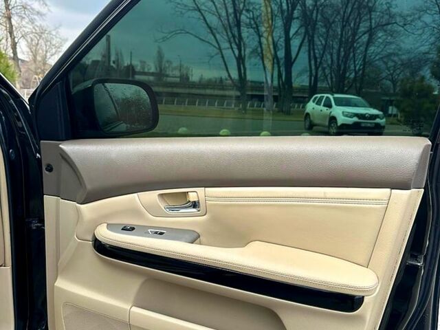 Черный Лексус РХ, объемом двигателя 3.5 л и пробегом 180 тыс. км за 12800 $, фото 1 на Automoto.ua