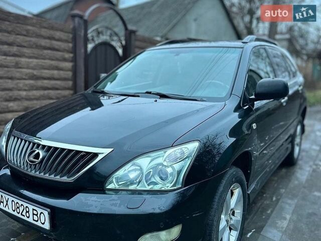 Черный Лексус РХ, объемом двигателя 3.46 л и пробегом 296 тыс. км за 9500 $, фото 2 на Automoto.ua