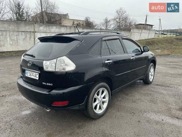 Черный Лексус РХ, объемом двигателя 3.5 л и пробегом 227 тыс. км за 12800 $, фото 4 на Automoto.ua