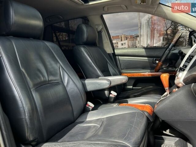 Черный Лексус РХ, объемом двигателя 3.46 л и пробегом 222 тыс. км за 16200 $, фото 22 на Automoto.ua