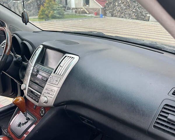 Чорний Лексус РХ, об'ємом двигуна 3.51 л та пробігом 225 тис. км за 12000 $, фото 25 на Automoto.ua