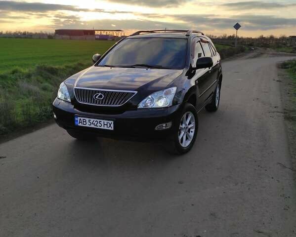 Черный Лексус РХ, объемом двигателя 3.5 л и пробегом 242 тыс. км за 10000 $, фото 1 на Automoto.ua