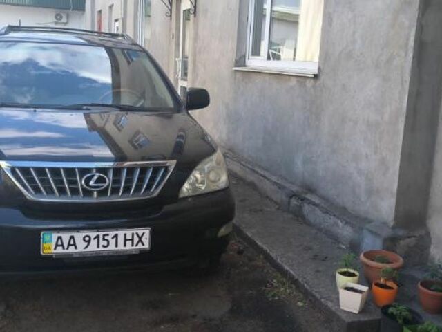 Черный Лексус РХ, объемом двигателя 3.5 л и пробегом 168 тыс. км за 10700 $, фото 1 на Automoto.ua