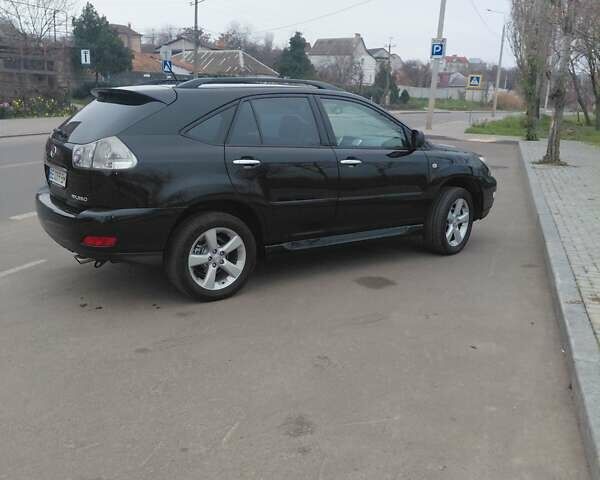 Чорний Лексус РХ, об'ємом двигуна 3.46 л та пробігом 276 тис. км за 10500 $, фото 1 на Automoto.ua