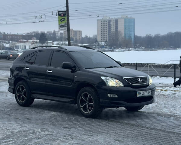 Черный Лексус РХ, объемом двигателя 3.46 л и пробегом 195 тыс. км за 11950 $, фото 87 на Automoto.ua