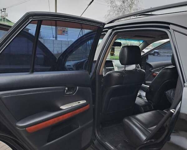 Черный Лексус РХ, объемом двигателя 3.46 л и пробегом 270 тыс. км за 9700 $, фото 12 на Automoto.ua