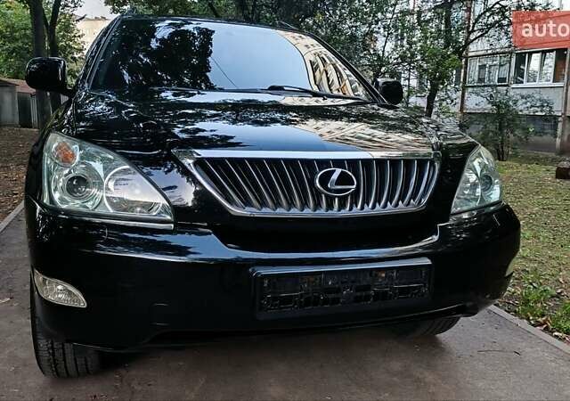 Чорний Лексус РХ, об'ємом двигуна 3.46 л та пробігом 231 тис. км за 9888 $, фото 2 на Automoto.ua