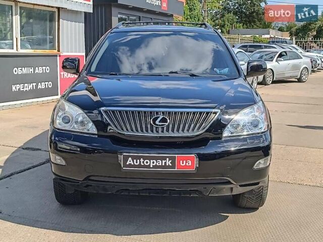 Черный Лексус РХ, объемом двигателя 3.5 л и пробегом 187 тыс. км за 11390 $, фото 1 на Automoto.ua