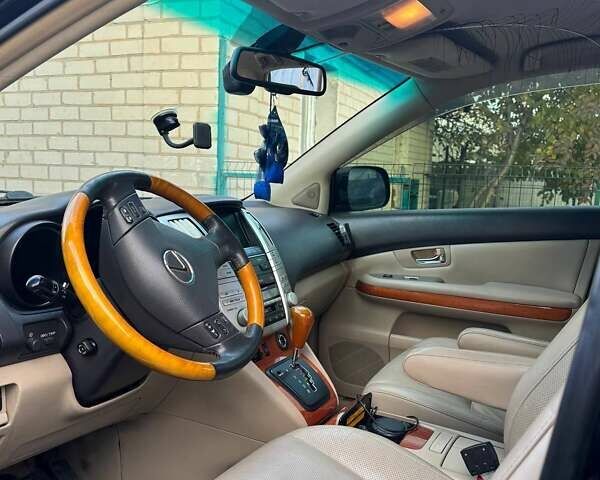 Черный Лексус РХ, объемом двигателя 3.3 л и пробегом 263 тыс. км за 13900 $, фото 6 на Automoto.ua