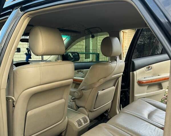 Черный Лексус РХ, объемом двигателя 3.3 л и пробегом 263 тыс. км за 13900 $, фото 3 на Automoto.ua