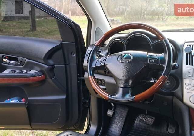 Черный Лексус РХ, объемом двигателя 3.46 л и пробегом 145 тыс. км за 17700 $, фото 64 на Automoto.ua