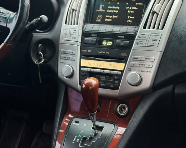 Черный Лексус РХ, объемом двигателя 3.46 л и пробегом 195 тыс. км за 11950 $, фото 109 на Automoto.ua