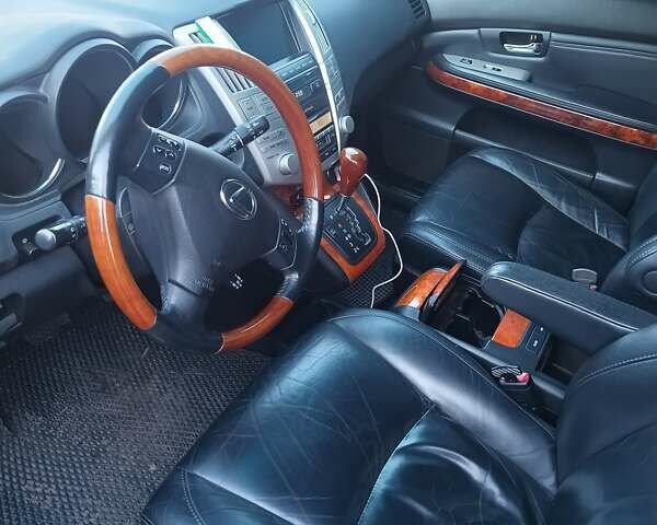 Черный Лексус РХ, объемом двигателя 3.46 л и пробегом 165 тыс. км за 13500 $, фото 6 на Automoto.ua