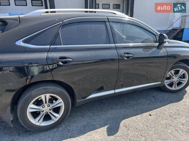 Черный Лексус РХ, объемом двигателя 3.46 л и пробегом 215 тыс. км за 15500 $, фото 1 на Automoto.ua