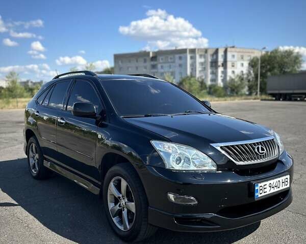 Черный Лексус РХ, объемом двигателя 3.46 л и пробегом 165 тыс. км за 13400 $, фото 1 на Automoto.ua