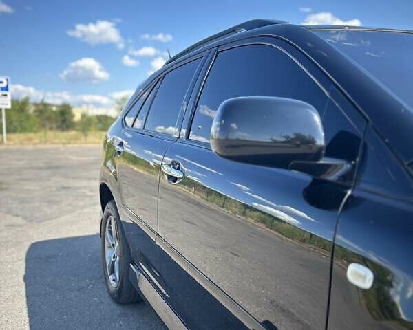 Черный Лексус РХ, объемом двигателя 3.46 л и пробегом 165 тыс. км за 13400 $, фото 6 на Automoto.ua