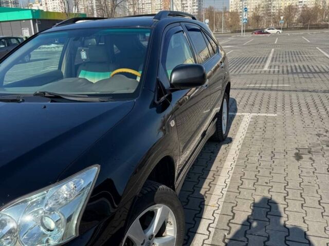 Черный Лексус РХ, объемом двигателя 3.46 л и пробегом 167 тыс. км за 14500 $, фото 2 на Automoto.ua